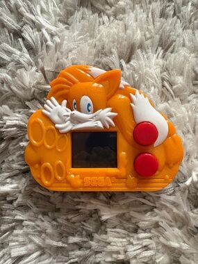 McDonald’s Sega Tails Orange Pocket Handheld Game - Orange with Red Buttons